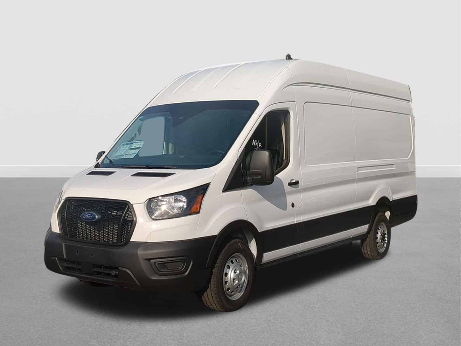 A white Ford Transit cargo van is parked on a plain surface with a grey background.