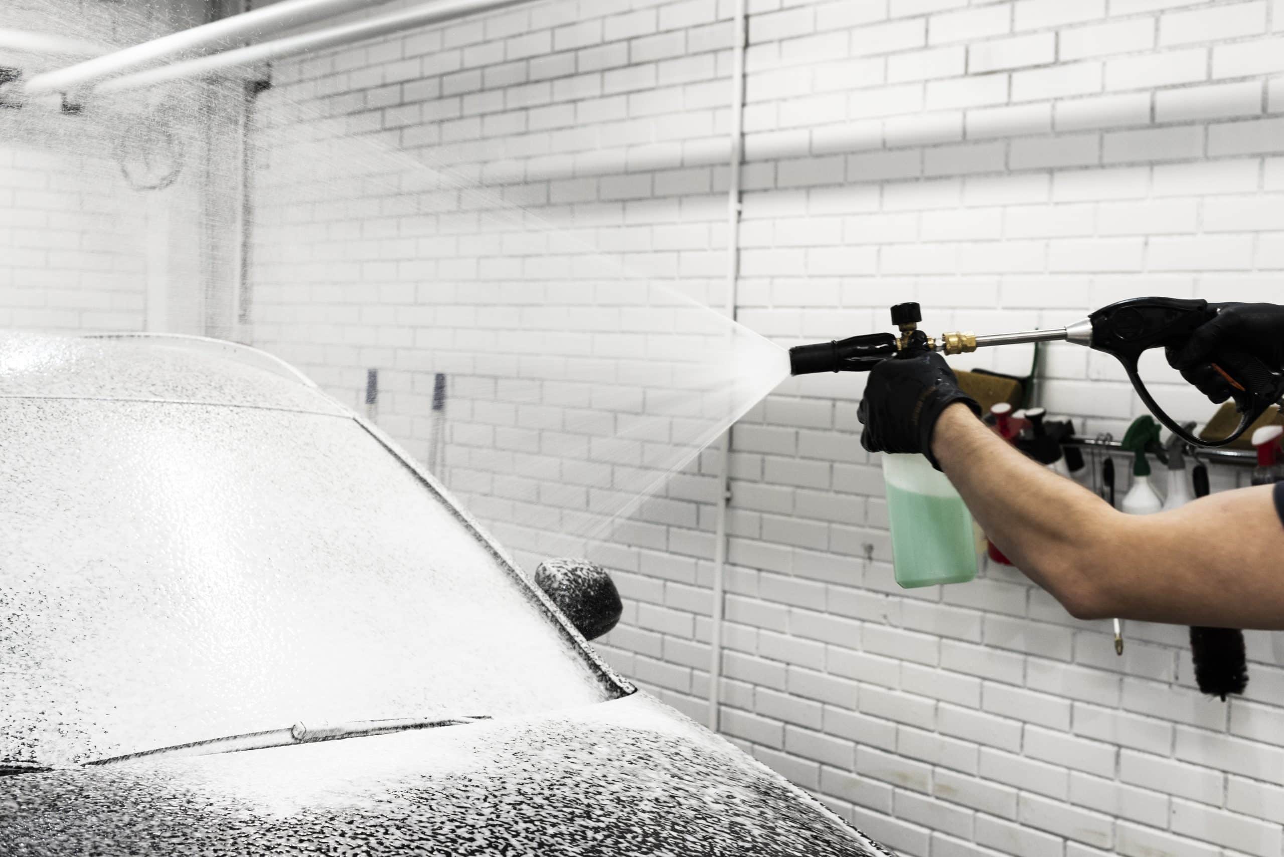 A man spying a car in a car wash Profitability | Lazrtek
